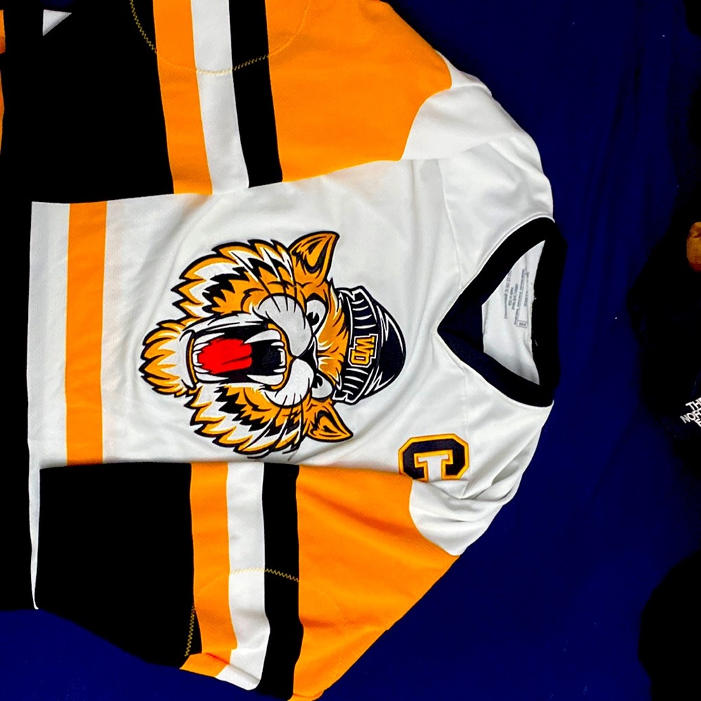 White hockey jersey with yellow & black stripes with 
Custom Tiger Mascot